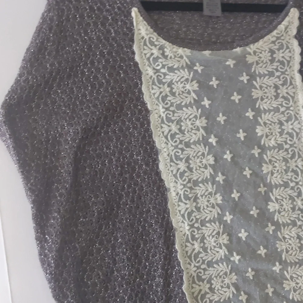 Gray and cream batwing type/ sleeveless crochet sweater. Women's size large